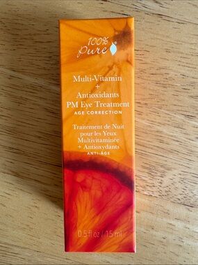 100% Pure PM Eye Treatment - Orange and Red Packaging